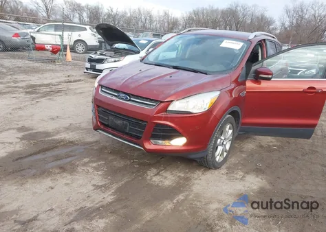 2015 Ford Escape Titanium z USA, uszkodzony, nr VIN 1FMCU0JX9FUC86604